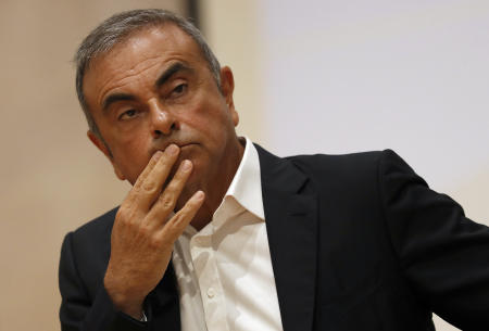In this Sept. 29, 2020, file photo, former Nissan Motor Co. Chairman Carlos Ghosn holds a press conference at the Maronite Christian Holy Spirit University of Kaslik, as he launches an initiative to help Lebanon that is undergoing a severe economic and financial crisis, in Kaslik, north of Beirut, Lebanon. (AP)