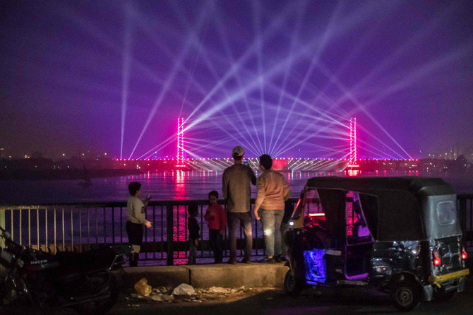 Lights are seen over the River Nile in the Egyptian capital Cairo during New Year's Eve celebrations on December 31, 2020. (AFP)