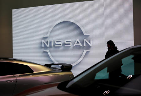 A visitor is seen at a Nissan Motor Corp. showroom in Tokyo, Japan, November 11, 2020. (Reuters)
