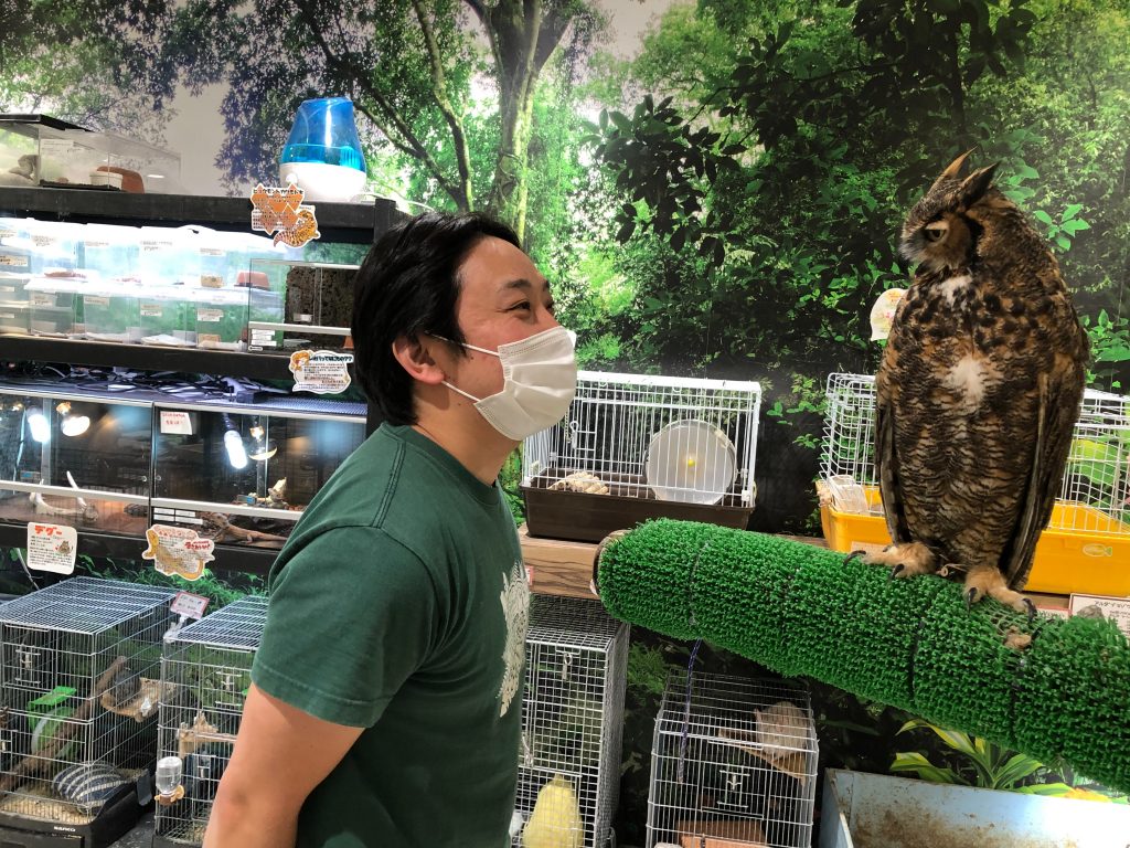 Masafumi Kobayashi, shop manager, checks an awl resting at a branch (ANJ photo)