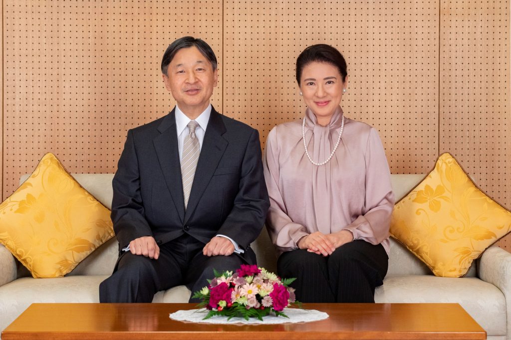 In this handout photograph taken on December 3, 2020 by the Imperial Household Agency and received on December 9, 2020, Japan's Emperor Naruhito and Empress Masako pose for a photo in Tokyo ahead of the Empress's 57th birthday on December 9. (AFP)