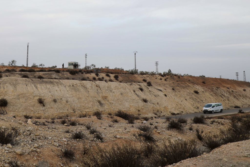 A concrete box placed by the Turkish Army, for use as a guard point, is pictured overlooking the M4 highway near the town of Ariha in Syria's rebel-held northwestern Idlib province on January 4, 2021.  (AFP)