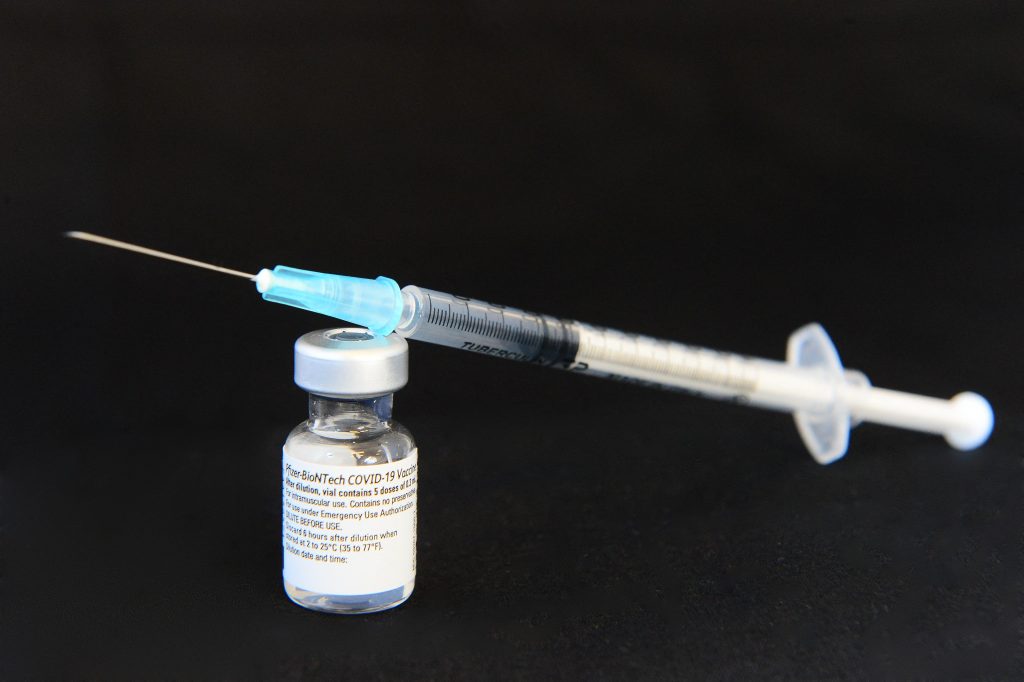A vial and a syringe of the Pfizer/BioNTech COVID-19 vaccine. (AFP)