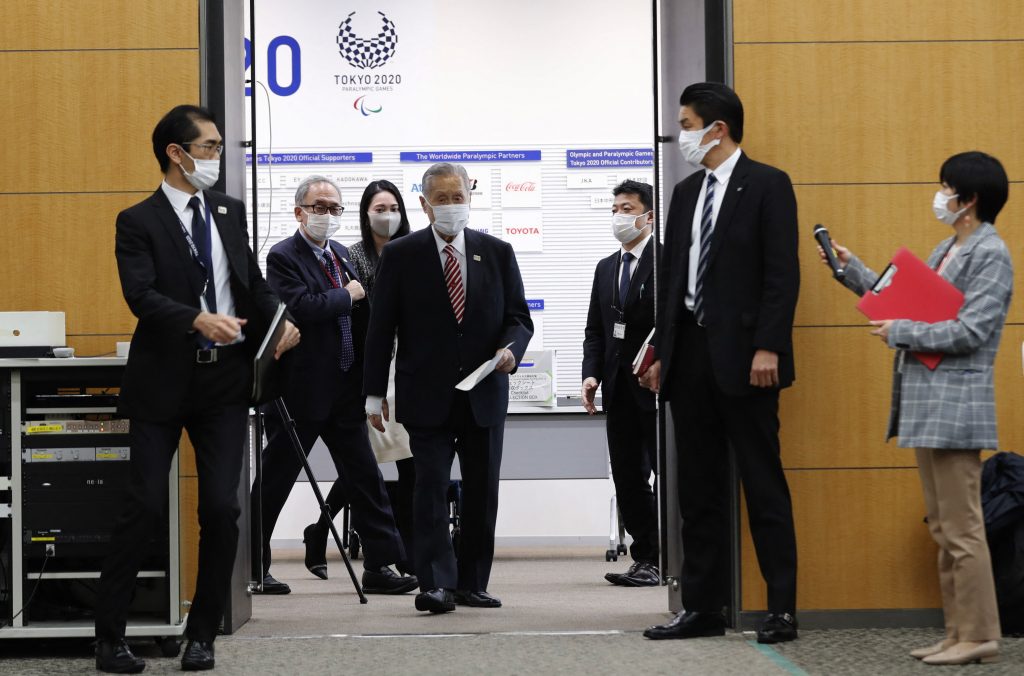 Tokyo 2020 president Yoshiro Mori enters a venue for a news conference in Tokyo on February 4, 2021. (AFP)