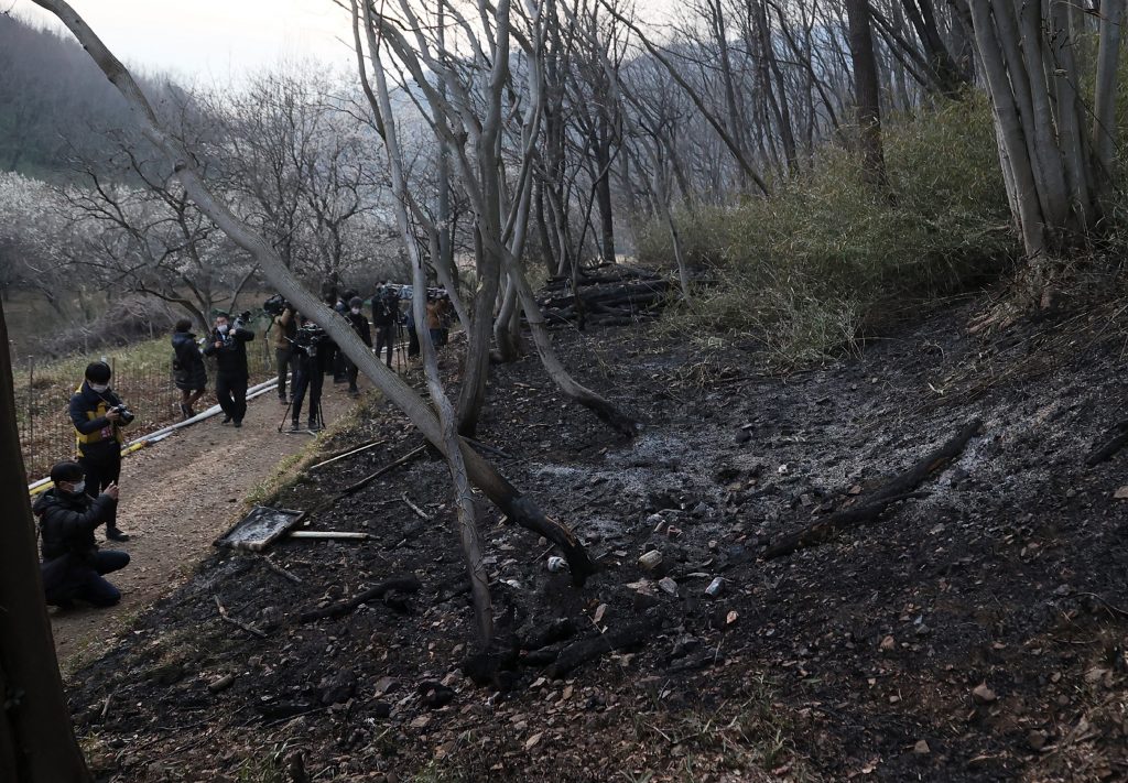 The fire in the vicinity of Ashikaga city, in Tochigi prefecture, has continued to spread since breaking out Sunday, despite efforts by firefighters on the ground and military helicopters dousing the area. (AFP)