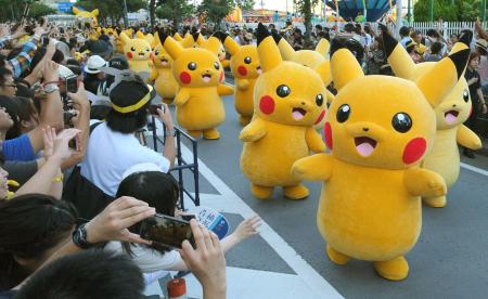 In this file photo taken on August 7, 2016 performers dressed as Pikachu, the popular animation Pokemon series character, perform in the Pikachu parade in Yokohama. (AFP)