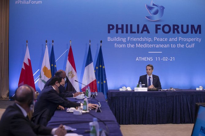 From left: Bahrain's Foreign Minister Abdullatif Al-Zayani, Cypriot Foreign Minister Nicos Christodoulides, and Egyptian Foreign Minister Sameh Shoukry listen to the speech of Greek Prime Minister Kyriakos Mitsotakis (right) during a meeting , in Athens, on Thursday, Feb. 11, 2021. (AP)