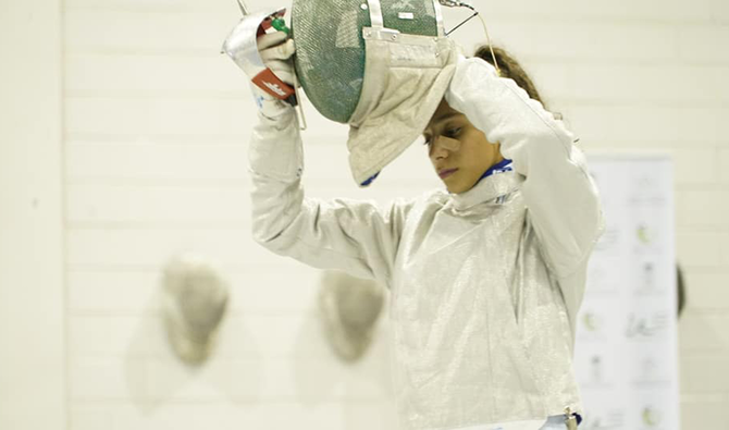 Inspired by her father’s athletic career, Ruba Al-Masri took up fencing three years ago, and has since claimed silver and gold medals in local and international championships. (Supplied)