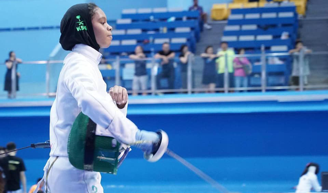 Inspired by her father’s athletic career, Ruba Al-Masri took up fencing three years ago, and has since claimed silver and gold medals in local and international championships. (Supplied)