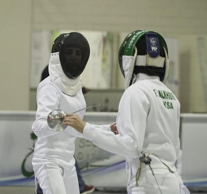 Inspired by her father’s athletic career, Ruba Al-Masri took up fencing three years ago, and has since claimed silver and gold medals in local and international championships. (Supplied)