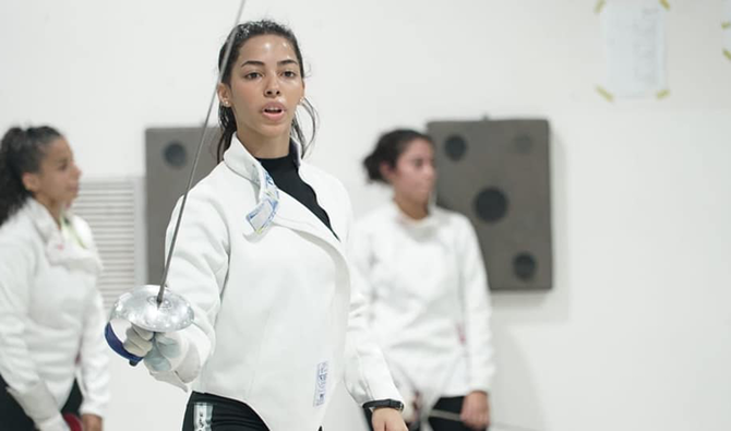Inspired by her father’s athletic career, Ruba Al-Masri took up fencing three years ago, and has since claimed silver and gold medals in local and international championships. (Supplied)