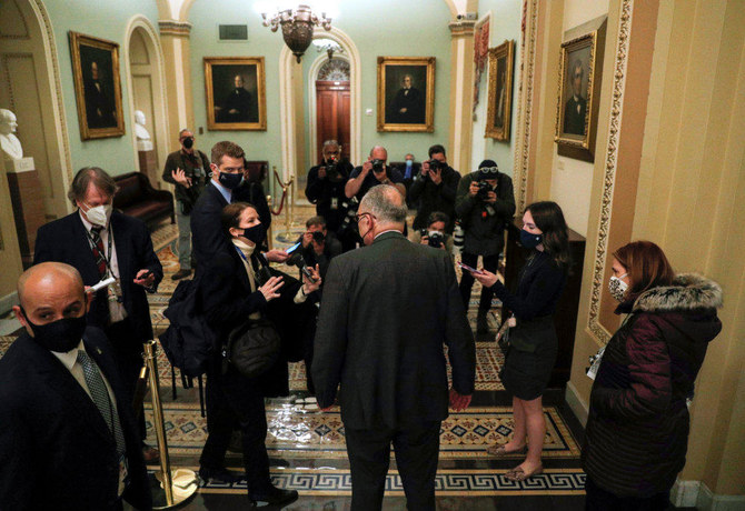 Senate Majority Leader Chuck Schumer speaks to reporters at the Capitol after the third day of senate impeachment hearings against former US President Donald Trump in Washington on February 11, 2021. (REUTERS/Tom Brenner)