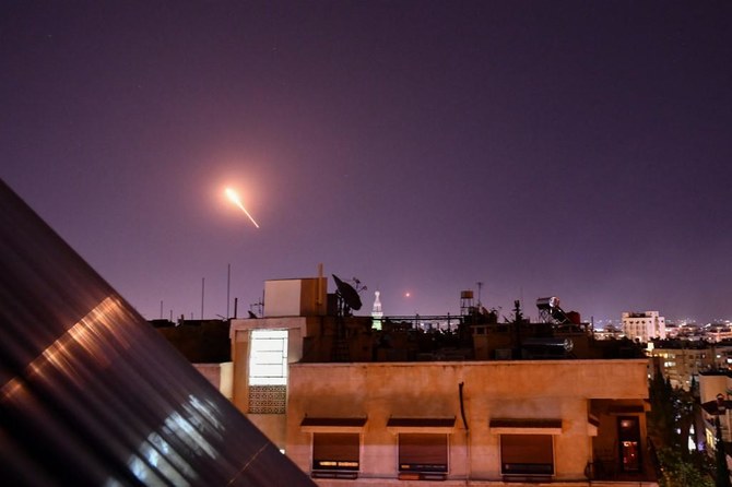 Israel has been regularly carrying out attacks in Damascus, above aimed at ending Tehran’s entrenched military presence in Syria. Above, Syrian air defenses target Israeli missiles on July 20, 2020. (AFP)