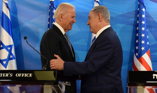 Then-Vice President Joe Biden (L) and Israeli Prime Minister Benjamin Netanyahu shake hands while giving joint statements at the Prime Minister’s Office in Jerusalem, March 9, 2016. (Debbie Hill/AFP via Getty Images via JTA)