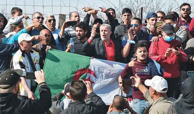 Algerians gather outside the Kolea prison near the city of Tipasa, some 70km west of the capital Algiers on Friday. (AFP)