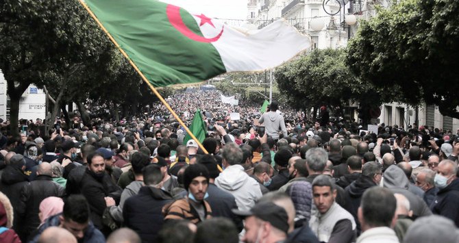 The mass rally in Algiers was the largest since weekly Hirak demonstrations were suspended in March last year in response to the COVID-19 pandemic. (AP)