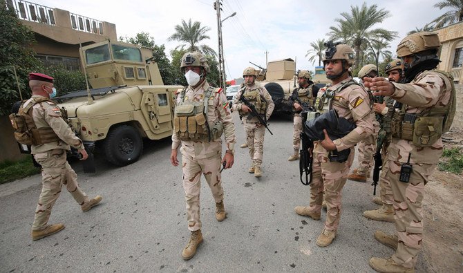 Iraqi forces search the area in Tarmiyah, 35 kilometres (20 miles) north of Baghdad on February 20, 2021, following clashes with Daesh fighters. (AFP)