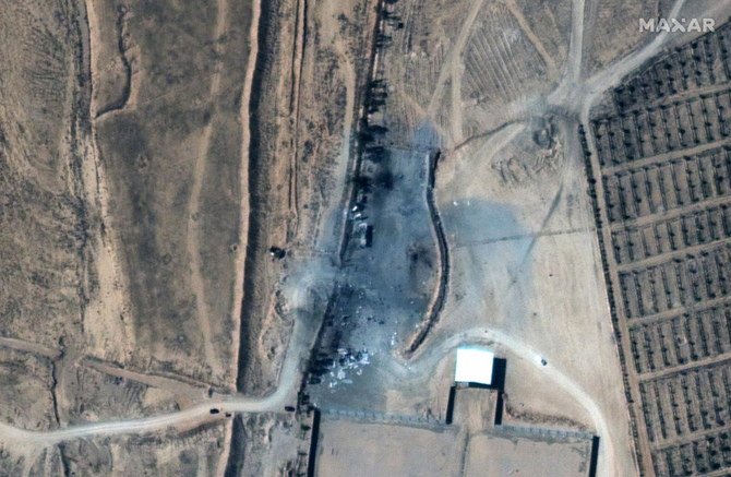 A close up view of destroyed buildings at an Iraq-Syria border crossing after airstrikes, seen in this February 26, 2021 handout satellite image provided by Maxar. (Reuters)