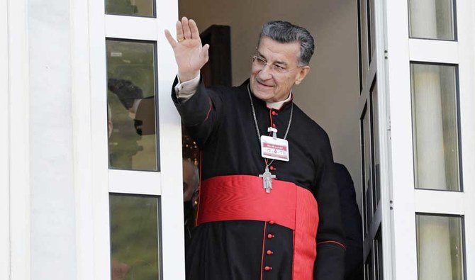 Lebanon's Cardinal Mar Bechara Boutros al-Rahi (or Rai) greets supporters ahead of a speech on February 27, 2021 at the Maronite Patriarchate in the mountain village of Bkerki, northeast of Beirut. (AFP)