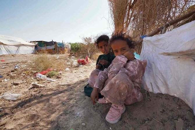 Yemeni children are pictured at the Jaw al-Naseem camp for internally displaced people on the outskirts of the northern city of Marib, on February 18, 2021. (AFP)