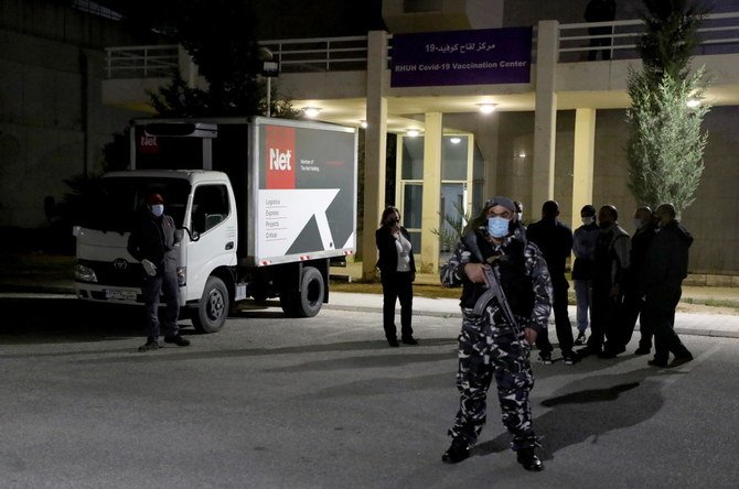 A truck carrying the first batch of doses of the Pfizer/BioNTech vaccine against the coronavirus disease (COVID-19) arrives at Rafik Hariri University Hospital, in Beirut, Lebanon February 13, 2021. (Reuters)