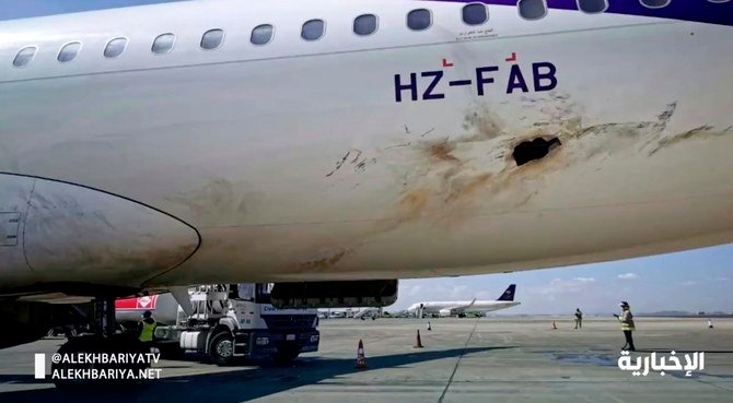 Saudi state television shows an airplane damaged in the attack by Yemen's Houthi militants at Abha Airport. (AP)
