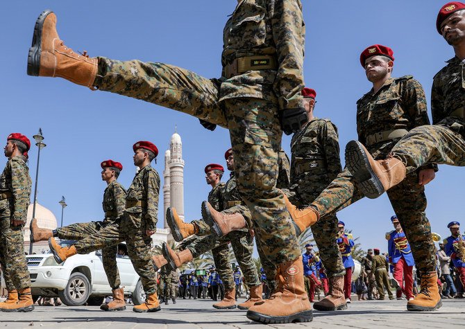 Houthi fighters at a recent funeral in Sanaa. The militants are refusing to release politicians and journalists as part of a prisoner swap. (AFP/File)