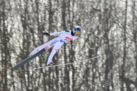 Japan's Ryoyu Kobayashi competes at the men's Ski Jumping World Cup event in Rasnov, Romania, Friday, Feb. 19, 2021. (AP)