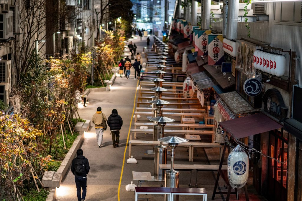 A general view of cleared restaurant dining tables are seen in the Shibuya district of Tokyo on Jan. 8, 2021. (AFP)
