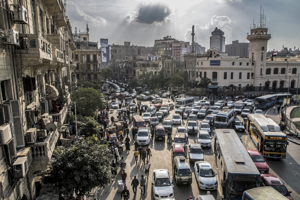 This picture taken on February 22, 2021 shows a view of vehicles stuck in a traffic jam in the central Attaba district of Egypt's capital Cairo. (AFP)