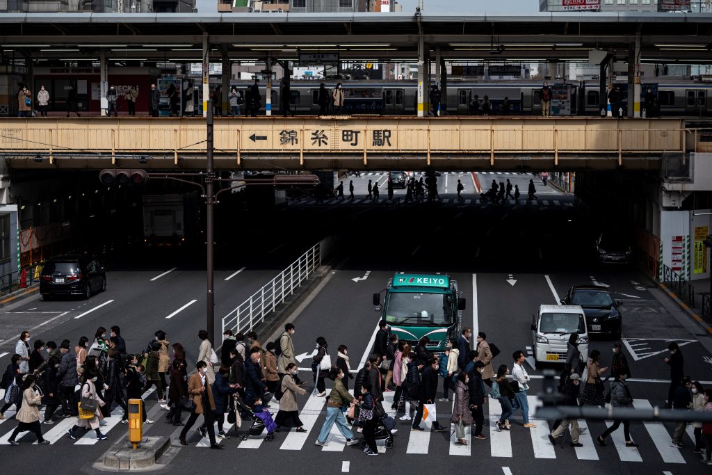  Japan's government is leaning towards ending a state of emergency for Tokyo and surrounding areas over COVID-19 as scheduled on March 21. (AFP)