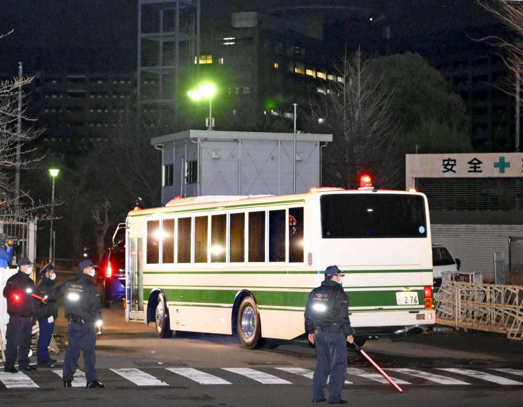 A vehicle carrying the man who appear to be Michael Taylor arrives at Tokyo Detention Center in Tokyo, March 2, 2021. (File photo/Kyodo News via AP)