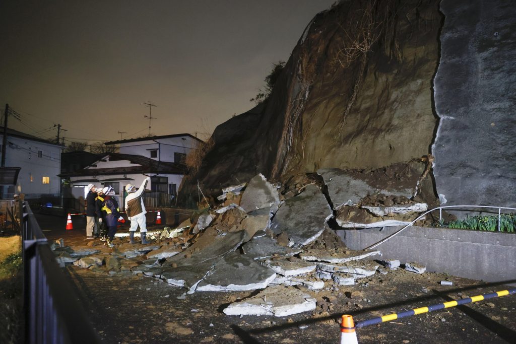 A collapsed section of a cliff is seen in Shiogama, Miyagi Prefecture, northern Japan, March. 20, 2021, after a powerful earthquake struck northeastern Japan. (File photo/Kyodo News via AP)