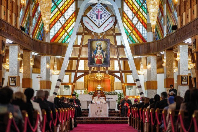 Pope Francis speaks at the Syriac Catholic Cathedral of Our Lady of Salvation (Sayidat al-Najat) in Baghdad at the start of the first ever papal visit to Iraq on March 5, 2021. (AFP)