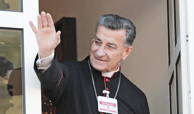 Lebanon's Cardinal Mar Bechara Boutros al-Rahi greets supporters ahead of a speech on February 27, 2021 at the Maronite Patriarchate in the mountain village of Bkerki, northeast of Beirut. (AFP)