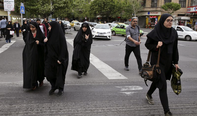 Pedestrians cross a street in Tehran, Iran. (AP/File)