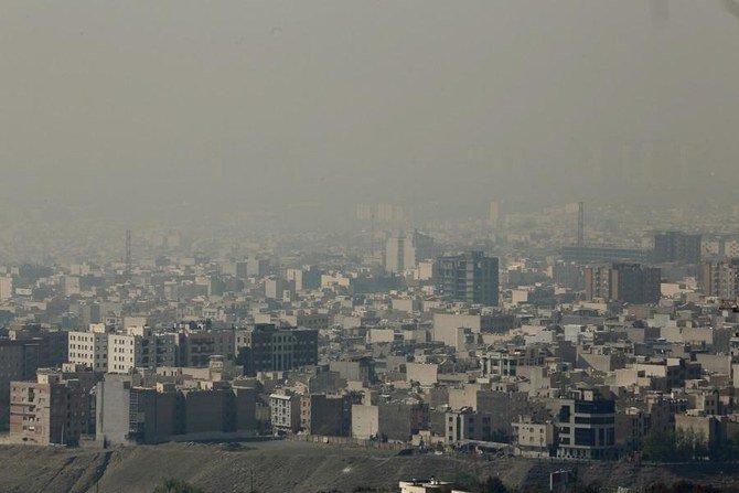 A general view taken from Western Tehran shows a blanket of brown-white smog covering the city as heavy pollution hit the Iranian capital on November 13, 2019. (File/AFP)