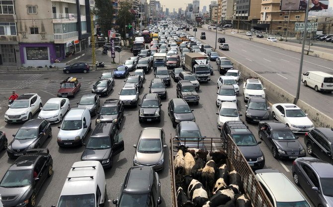 Vehicles stuck in a traffic jam caused by demonstrators blocking a highway during a protest against the fall in Lebanese pound currency and mounting economic hardships, in Jal el-Dib, Lebanon (REUTERS)
