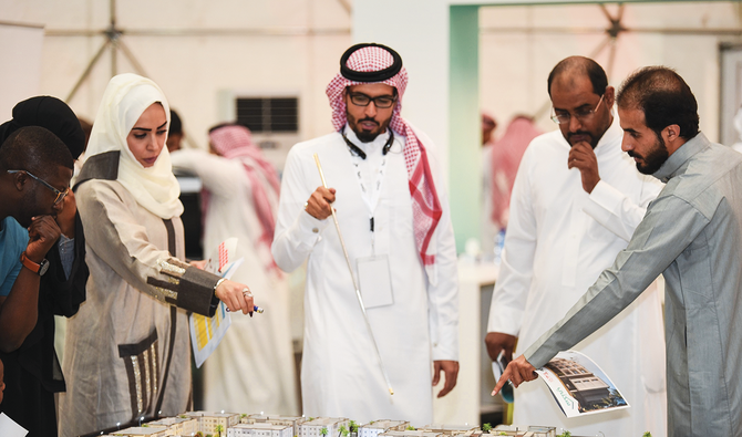 Marwa Ahmed Murad, 4th from right, says MDMS has also been working closely with the National Housing Co. to develop housing projects for Saudi citizens. (Supplied)