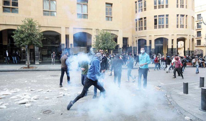 The protests were in Bekaa and came as the national currency continued to slide in value, with the black market dollar exchange rate hitting LBP13,000. (AFP)