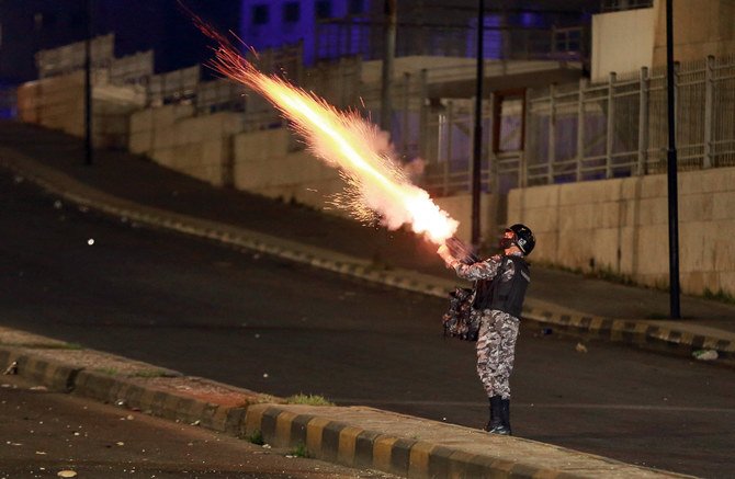 Authorities deployed several thousand anti-riot police to disperse protesters as dozens of activists were rounded up in several cities and towns. (AFP)