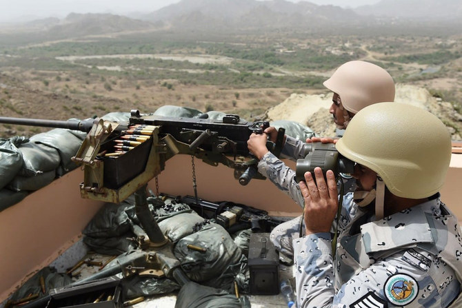 Members of the Saudi border guard are stationed at a look-out point on the Saudi-Yemeni border, in southwestern Saudi Arabia. (AFP file photo]