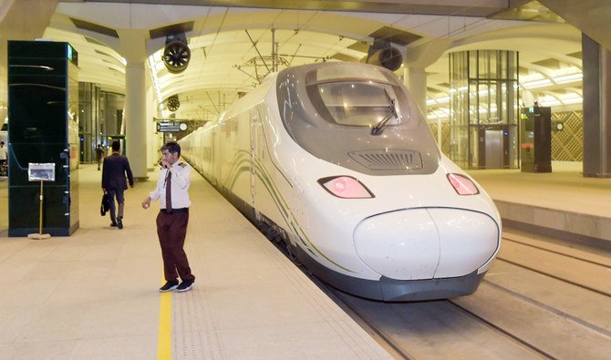 A member of the station staff talks on a two-way radio at Makkah’s train station on October 8, 2019 the new high-speed railway line linking Makkah and Madinah. (AFP)