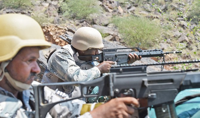 In this file photo taken on October 03, 2017 Saudi border guards keep watch along the border with Yemen in the al-Khubah area in the southern Jizan province. (AFP)