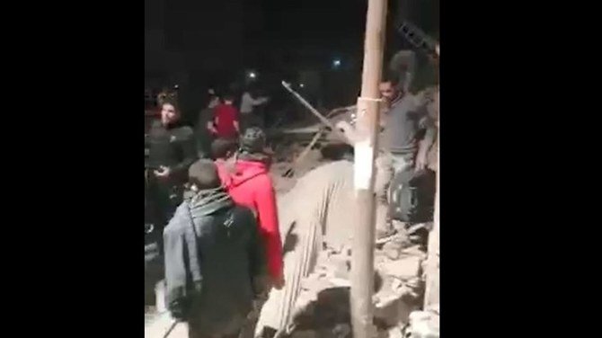 Police cordoned off the area in Cairo’s Gesr al-Suez district while civil defense and ambulance forces sifted through the rubble in a rescue operation. (video screen grab)
