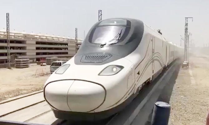 Passengers are required to observe social distancing measures. (SPA)