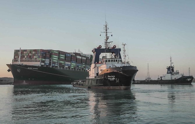 The Ever Given, a Panama-flagged cargo ship is pulled by one of the Suez Canal tugboats, in the Suez Canal, Egypt, Monday, March 29, 2021. (AP/Suez Canal Authority)