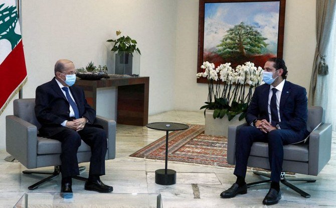 President Michel Aoun and Prime Minister-designate Saad Hariri. (File/AFP)