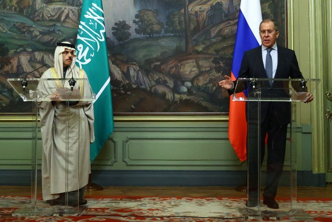 Russian Foreign Minister Sergey Lavrov and his Saudi counterpart Prince Faisal bin Farhan hold a joint press conference following their meeting in Moscow on Jan. 14, 2021. (File/AFP)