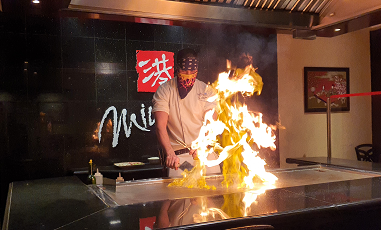 Mohamed Elsayed ensures that the guests at Minato are enthralled with his skilled manoeuvres on the metal plate. (Supplied)